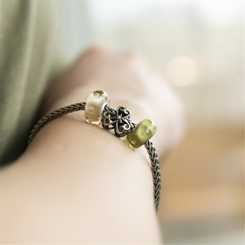 trollbeads-tagbe-20232-geluk-bedel-van-zilver-met-bloemen-en-hartjes