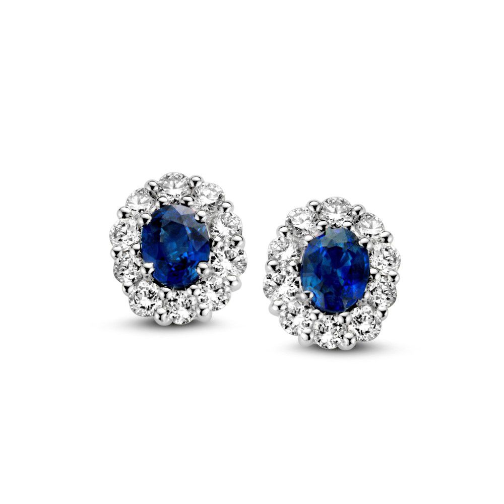 Oorknoppen witgoud met 0.68 crt diamant en 0.96 crt saffier