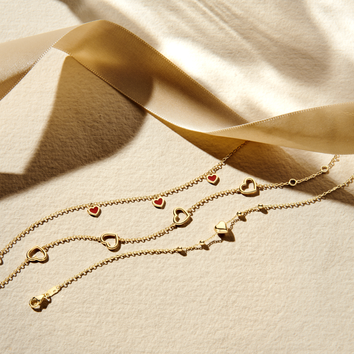 14-karaat gouden schakelarmband met ankerschakel hart 7.5 mm breed - Lengte 16-17.5-19 cm