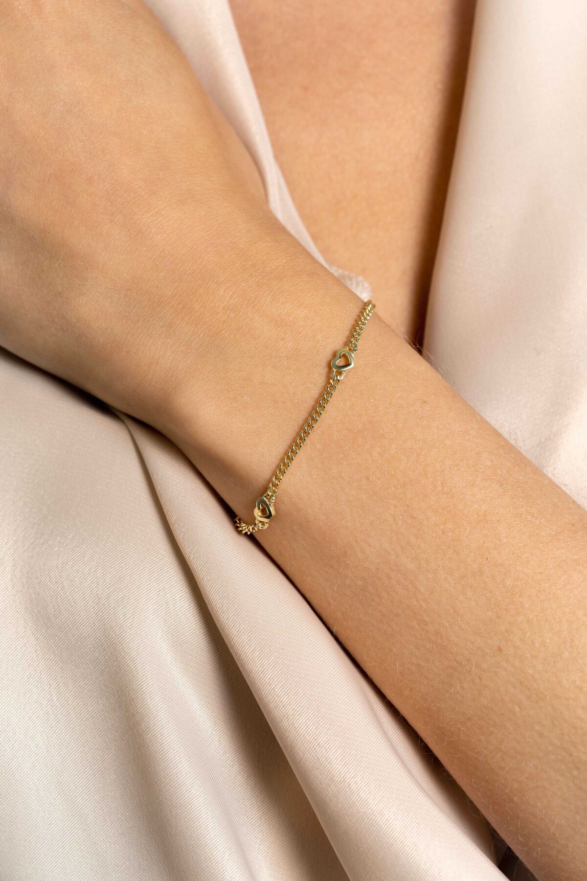Zinzi ZIA2409G goudkleurige armband met hartjes 4.7 mm breed - Lengte 17-20 cm