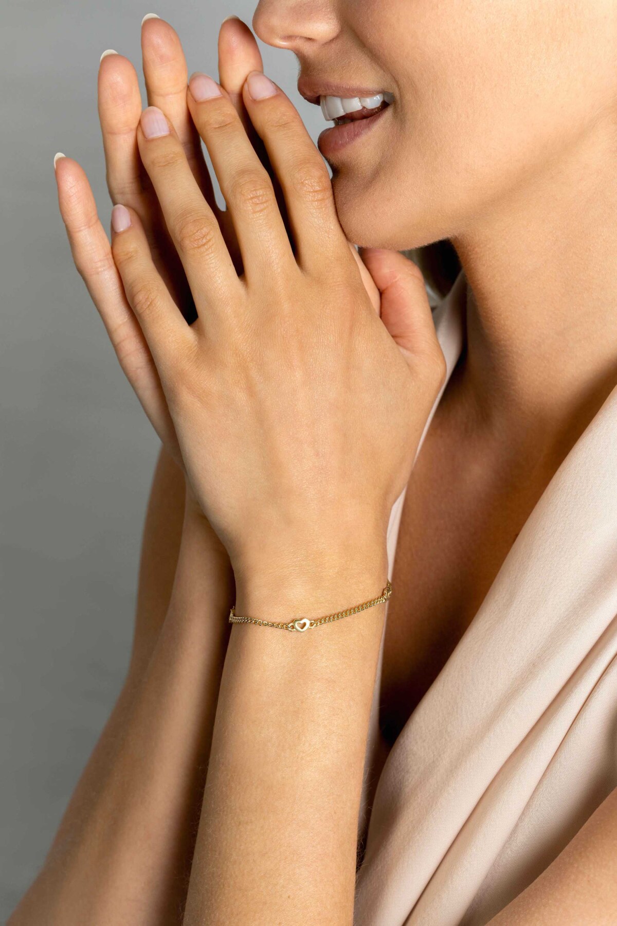 Zinzi ZIA2409G goudkleurige armband met hartjes 4.7 mm breed - Lengte 17-20 cm