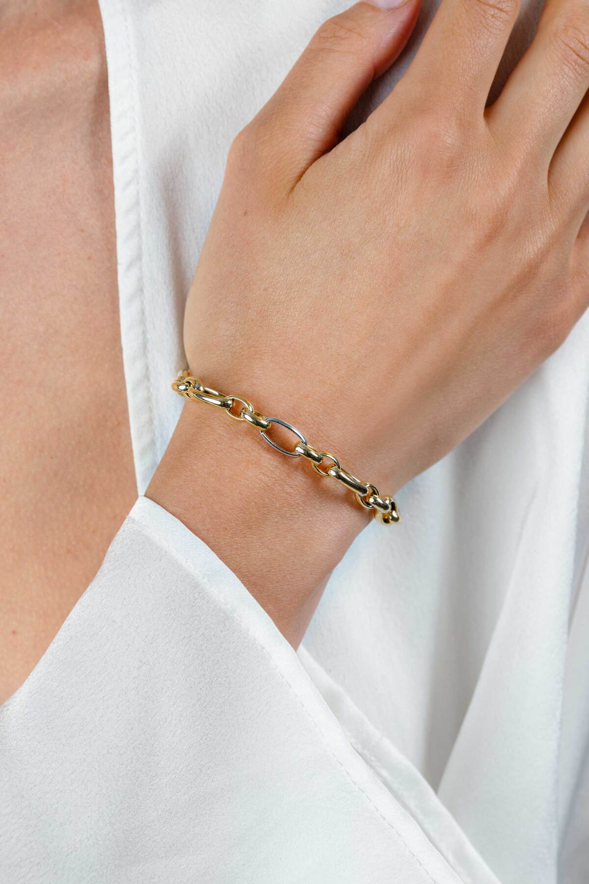 Zinzi ZIA2639 gold plated schakelarmband met 3 zilveren ovale schakels 7.5 mm breed - Lengte 19 cm