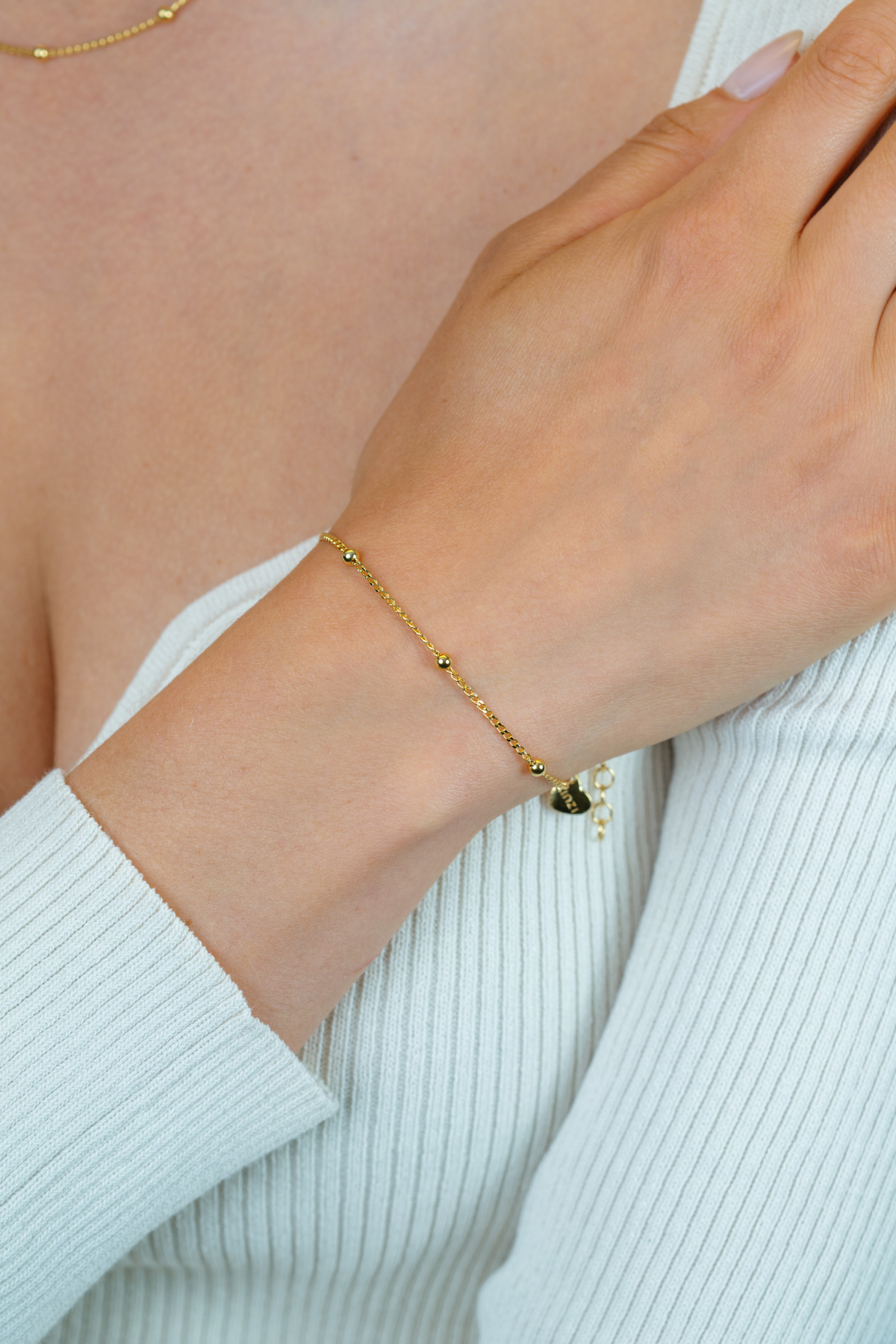 Zinzi ZIA2714G goudkleurige armband met bolletjes en gourmet schakels 3.1 mm breed - Lengte 18-21 cm